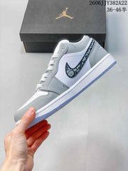 Air Jordan 1 Low White Grey Patterned Swoosh Sneakers