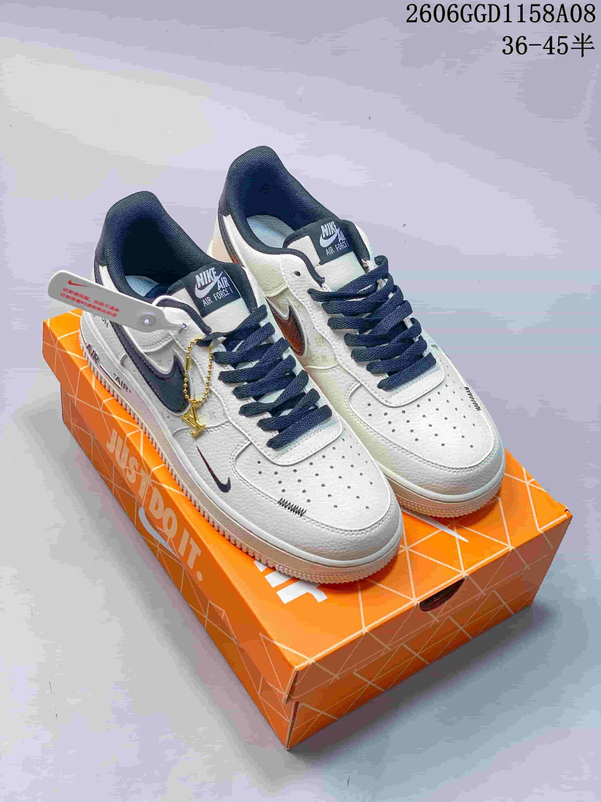 Nike Air Force 1 Low Cream and Navy Sneakers