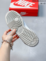 Nike Mini Swoosh Low-Top Sneakers in Sail and Grey