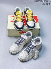 Nike Dunk Low Retro Sneakers in White and Navy