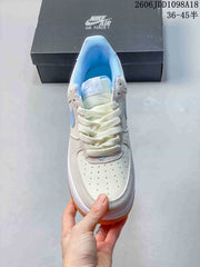 Nike Air Force 1 Low White and Blue Gum Sole Sneakers