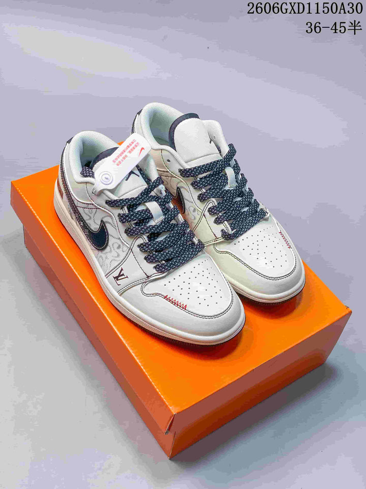 Air Jordan 1 Low Cream Sneakers with Monogram Pattern