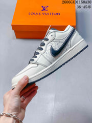 Air Jordan 1 Low Cream Sneakers with Monogram Pattern