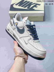 Nike Air Force 1 '07 Low Sneakers in White and Navy