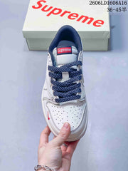 Jordan 1 Low Sneakers in White and Navy