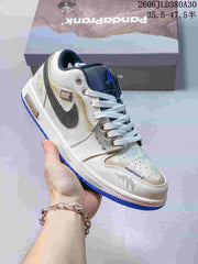 Jordan AJ1 Low Panda Prank Sneakers in White and Blue