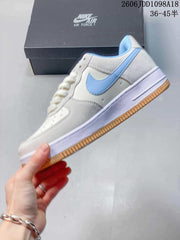 Nike Air Force 1 Low White and Blue Gum Sole Sneakers