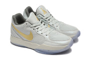 Nike Kyrie Low Basketball Shoes in Gray and Gold