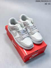 Nike Mini Swoosh Low-Top Sneakers in Sail and Purple