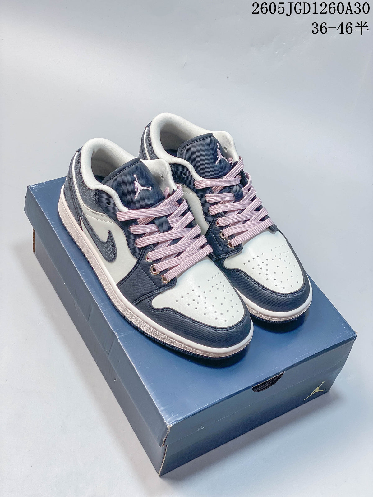 Air Jordan 1 Low Sneakers in Navy, White and Pink