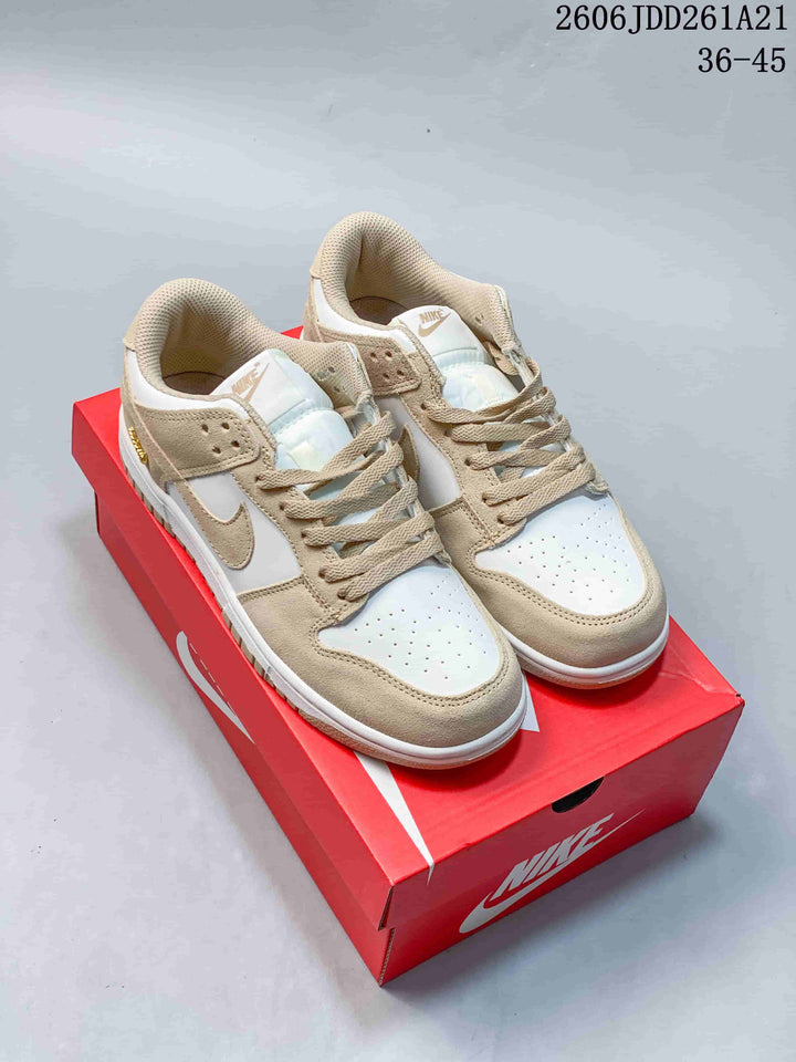 Nike Dunk Low Sneakers in White and Beige