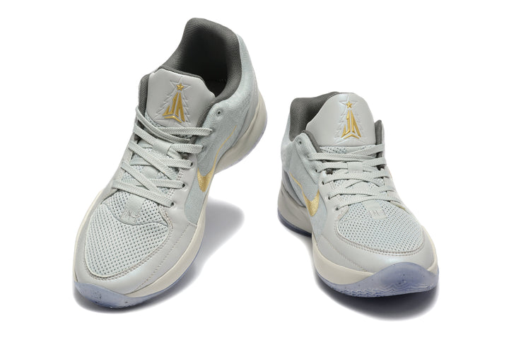 Nike Kyrie Low Basketball Shoes in Gray and Gold
