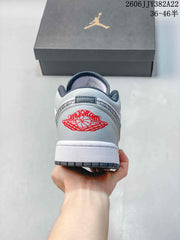 Jordan Air Jordan 1 Low Sneakers in White and Grey