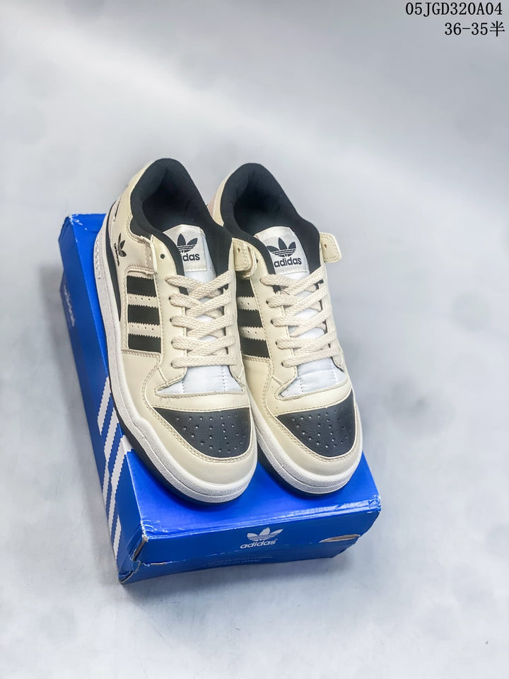 Adidas Originals Forum 84 Low Sneakers in Cream and Black