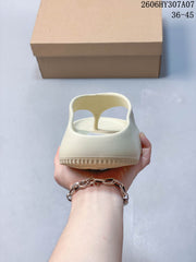 Nike Calm Slide Thong Sandals in Cream