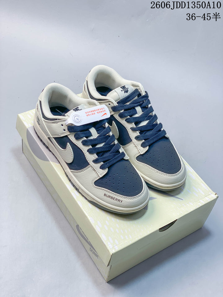 Nike SB Dunk Low Sneakers in Navy and Off-White