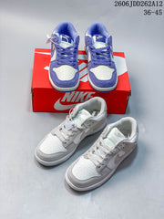 Nike Mini Swoosh Low-Top Sneakers in Sail and Purple