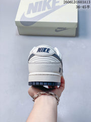 Nike Dunk Low Supreme-Style Sneakers in Cream and Navy