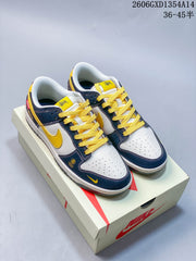 Nike Dunk Low Retro Sneakers in White and Navy