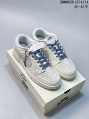 Nike Dunk Low Retro Sneakers in White and Navy
