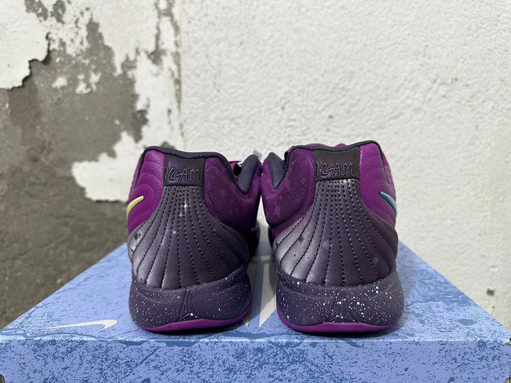 Nike Basketball Shoes in Purple with Turquoise Swoosh