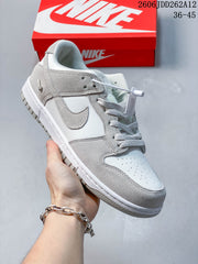 Nike Mini Swoosh Low-Top Sneakers in Sail and Grey