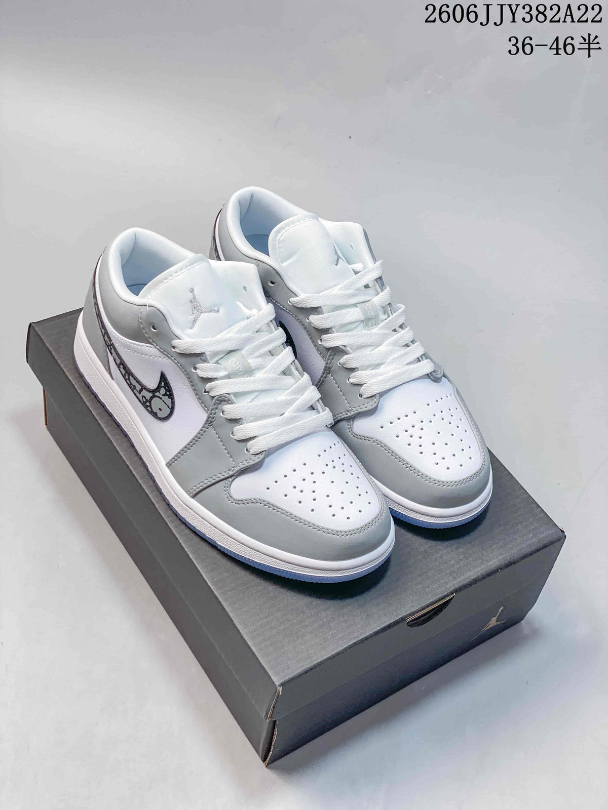 Air Jordan 1 Low White Grey Patterned Swoosh Sneakers