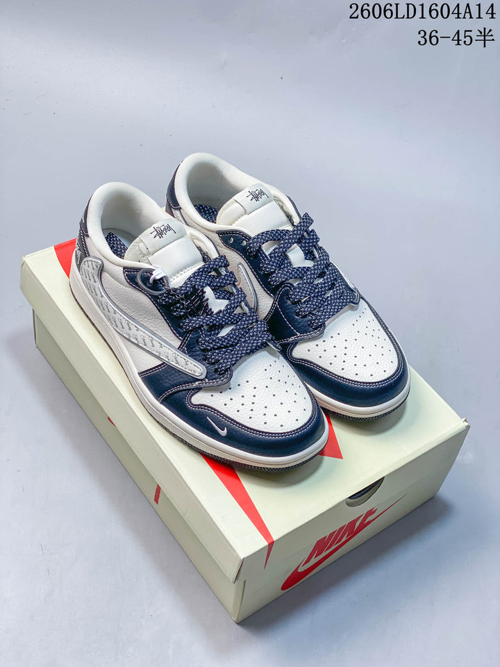 Nike Air Jordan 1 Low Graphic Sneakers in White and Navy