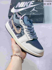 Jordan 1 Low Graffiti Sneakers in Gray and Cream