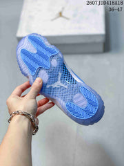 Jordan Air Jordan 11 Retro High-Top Sneakers Blue and White