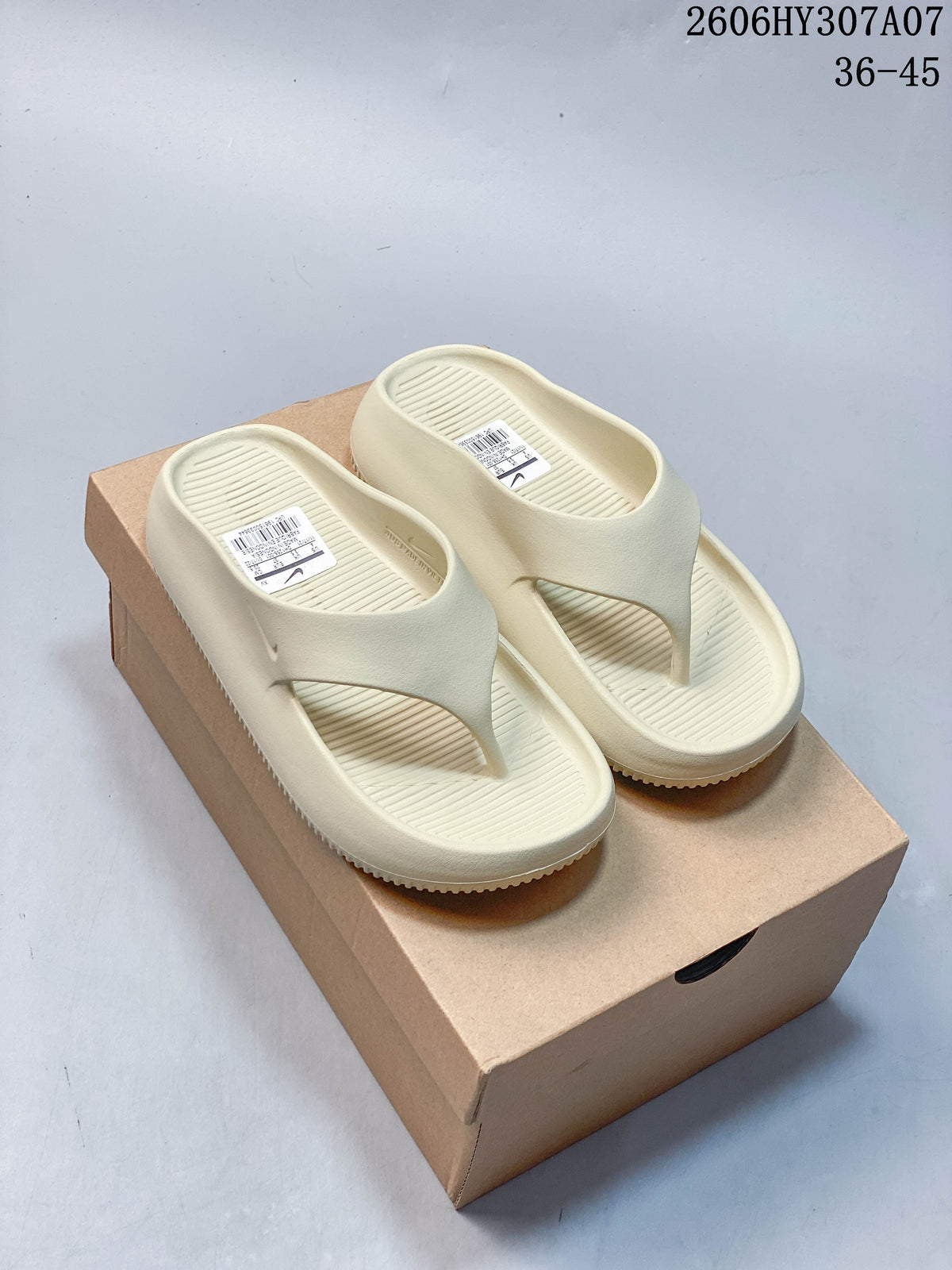 Nike Calm Slide Thong Sandals in Cream
