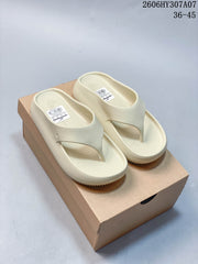 Nike Calm Slide Thong Sandals in Cream